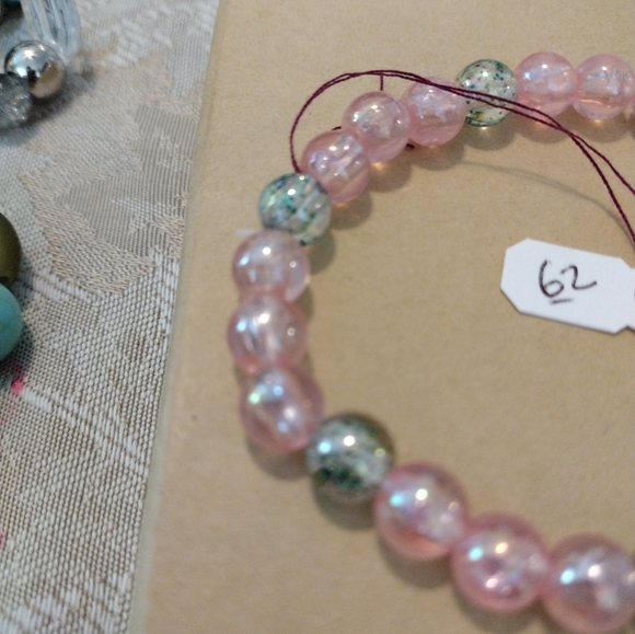 Artemis's Gems custom-made beaded bracelet with metal sun charm with face, pink - Picture 5 of 6